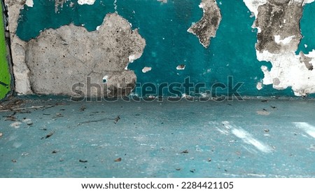 Green Abstract, old distressed brick wall Brick material, urban tile surface, colorful, old, deteriorated with time. Green weathered plaster cement mortar. abstract pattern background
