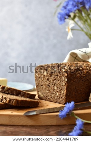 Homemade Estonian sourdough rye black bread with seeds Royalty-Free Stock Photo #2284441789