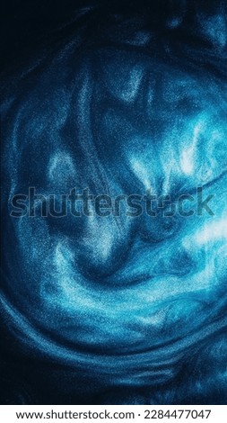 Sparkling fluid. Ink water. Storm wave. Blue color glowing shimmering glitter texture vapor cloud on dark black abstract background. Royalty-Free Stock Photo #2284477047