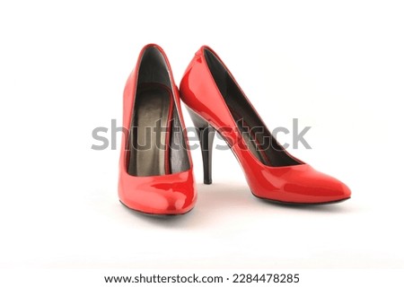 Red high heel shoes isolated on white background, clipping path included. Royalty-Free Stock Photo #2284478285