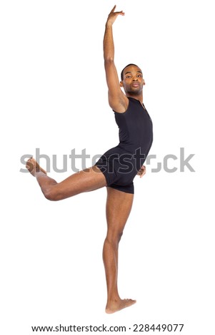 fit young black dancer balancing to show ballet forms on white background