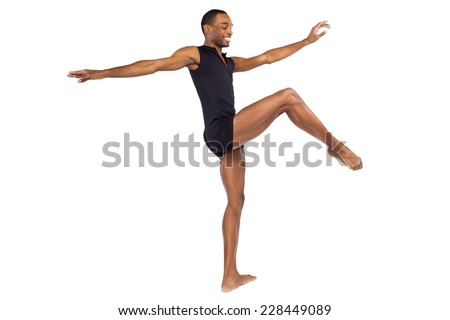 fit young black dancer balancing to show ballet forms on white background