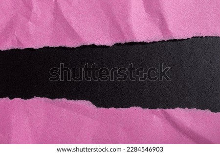 Pink torn paper background with copy space for your text