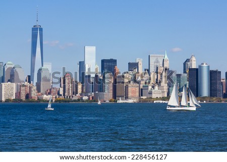 Sailboat on the Hudson river with New York City skyline at the background 