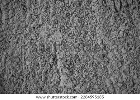 View of loose cement from above. Building material. Texture of scattered cement. Background..