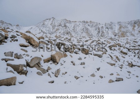 snow covered the rocks at Ladakh, Jammu and Kashmir, India