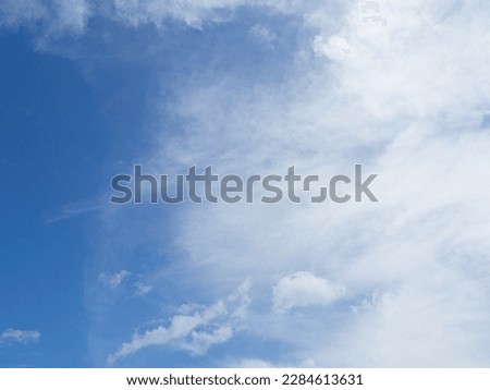 An image of a beautiful sky with clear clouds