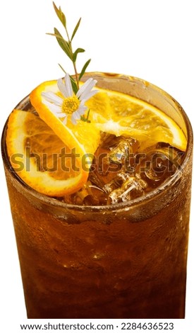peach tea and orange slices on top with white background.