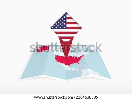 USA is depicted on a folded paper map and pinned location marker with flag of USA. Folded vector map. Royalty-Free Stock Photo #2284638505