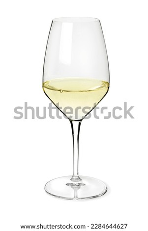 Single glass with  Portuguese vinho verde white wine close up on white background   Royalty-Free Stock Photo #2284644627