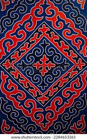 Traditional Kazakh ornament. An ornament that has been embroidered on carpets, blankets and other textiles since ancient times by the people of Kazakhstan. Decorative and applied art of nomads.  Royalty-Free Stock Photo #2284653361