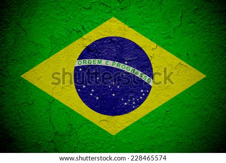Brazil flag on old grunge wall background