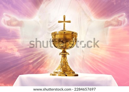 Chalice in an altar with God light in the background. Holy eucharist theme concept.