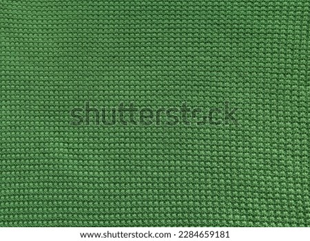Texture of green fabric. High quality stock photo. Textile background.