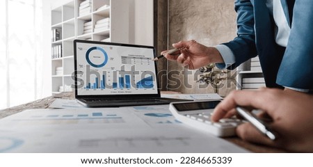 Business financial, accountant discussing with partner are meeting to audit finance planning sales to meet targets set in next year. stock market concept.. Royalty-Free Stock Photo #2284665339