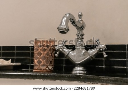 Luxury vintage faucet in the bathroom