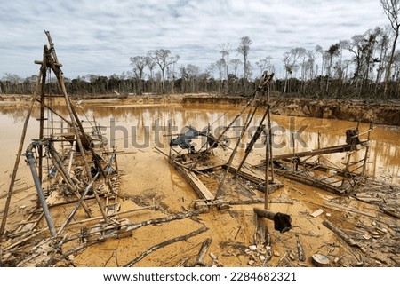 Illegal mining in the Peruvian jungle Royalty-Free Stock Photo #2284682321