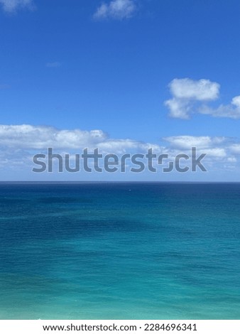 Upper view looking out onto deep emerald water of the Atlantic Ocean Miami Florida