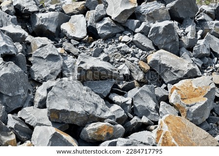 pile of rock granite railroad ballast Royalty-Free Stock Photo #2284717795