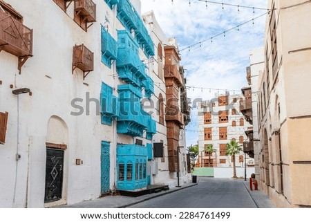 Al-Balad old town with traditional muslim houses with wooden windows and balconies, Jeddah, Saudi Arabia8 Royalty-Free Stock Photo #2284761499