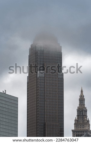 Cleveland Ohio Urban City Key Tower Skyline Tall Building With Clouds and Fog Dark Sky On A Cold, Foggy and Gloomy Day