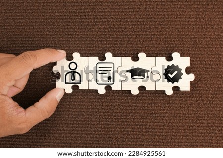 puzzle with qualifications, certificates and graduate icons. the concept of academic qualifications. the concept of required skills. Royalty-Free Stock Photo #2284925561