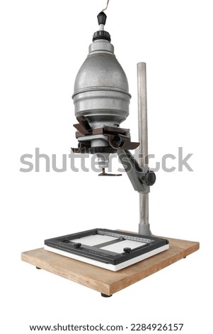 Vintage photographic enlarger for projecting photo negatives, isolated on white background, Contains clipping path