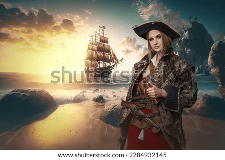 Attractive female buccaneer against background of sea and ship. High quality photo Shot of pirate woman dressed in costume on coast of tropical island. Royalty-Free Stock Photo #2284932145