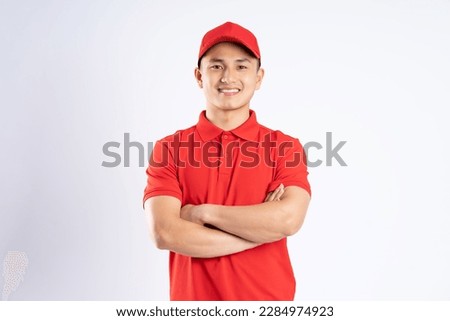 portrait of asian delivery man on white background Royalty-Free Stock Photo #2284974923
