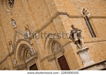 An imposing Gothic construction, begun at the end of the thirteenth century and continued with various interruptions until the beginning of the sixteenth century, the Cathedral dominates the city Royalty-Free Stock Photo #2285000105
