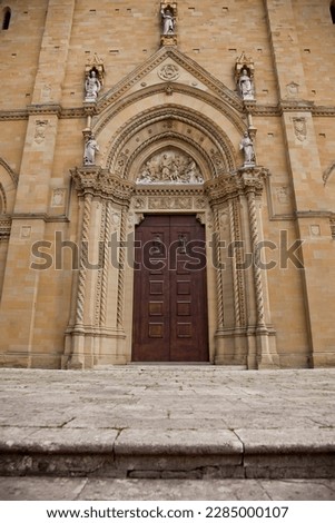 An imposing Gothic construction, begun at the end of the thirteenth century and continued with various interruptions until the beginning of the sixteenth century, the Cathedral dominates the city Royalty-Free Stock Photo #2285000107