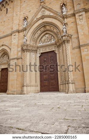 An imposing Gothic construction, begun at the end of the thirteenth century and continued with various interruptions until the beginning of the sixteenth century, the Cathedral dominates the city Royalty-Free Stock Photo #2285000165