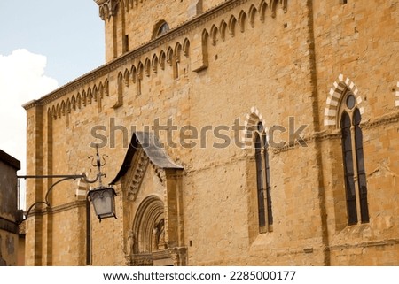 An imposing Gothic construction, begun at the end of the thirteenth century and continued with various interruptions until the beginning of the sixteenth century, the Cathedral dominates the city Royalty-Free Stock Photo #2285000177