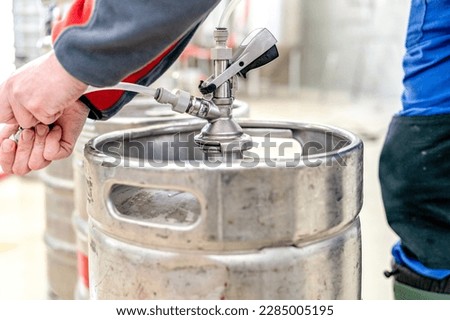 beer keg connected in pub. beer keg head Royalty-Free Stock Photo #2285005195