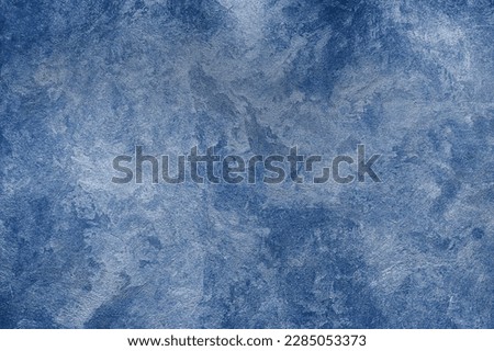 Texture of blue decorative plaster or concrete. Abstract grunge background for design. Royalty-Free Stock Photo #2285053373