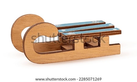 Wooden decorative sledge isolated on white background. Clipping Path. Full depth of field. Royalty-Free Stock Photo #2285071269