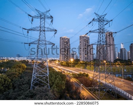 high-voltage power lines. high voltage electric transmission tower at night Royalty-Free Stock Photo #2285086075