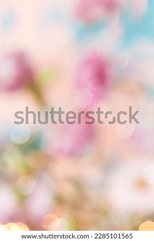 Abstract blurred floral background with spring and Mother's Day concept. Creative bokeh in pastel colors.