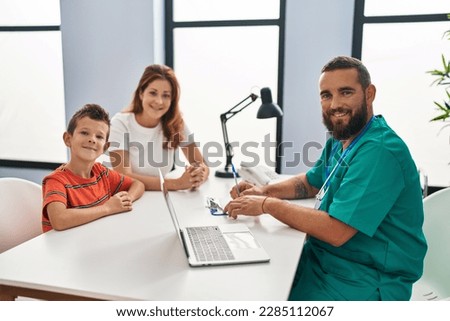 Family having medical consultation at clinic