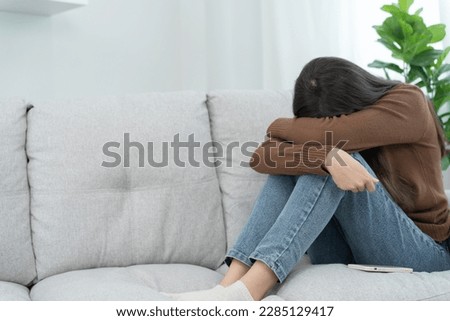 Unhappy asian woman girl disappointed, sad about problem in home alone, feel lonely, Stressed, suffering from bad relationship, break up, divorce, female confused, depression mental health, loneliness Royalty-Free Stock Photo #2285129417