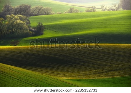 Amazing scenery of the South Moravian landscape in the light of the setting sun. Moravian Tuscany. Royalty-Free Stock Photo #2285132731