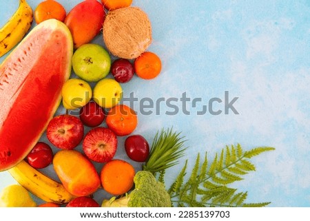 Healthy organic food background. Studio photo of different fruits  and vegtables on white background. High resolution image. Food photography of different fruits isolated white background copy space.