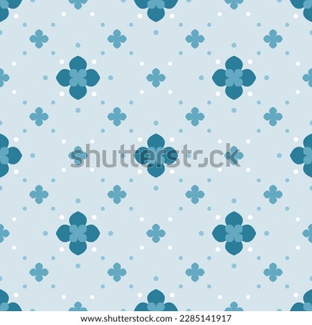 In this seamless pattern, the background is blue. Decorated with large and small flowers neatly arranged and surrounded by small circles that look soft and beautiful.