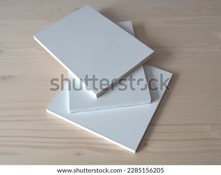 White free-foam PVC sheets. The closed, matt, fine-textured, and high-quality surface presents an excellent substrate for printing, painting, and laminating Royalty-Free Stock Photo #2285156205