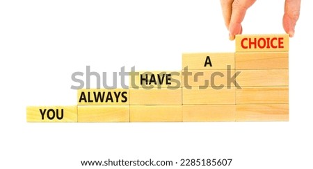 You always have choice symbol. Concept words You always have a choice on wooden block. Beautiful white table white background. Businessman hand. Business you always have choice concept. Copy space.