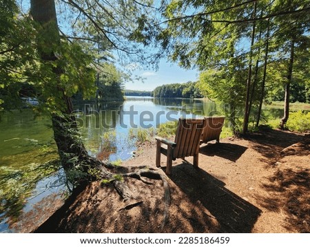 Taking a Rest Along the Trail Beside a Lake in Northern Ontario Royalty-Free Stock Photo #2285186459