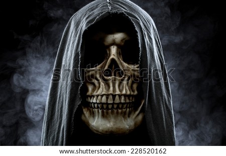 Grim reaper, portrait of a skull in the hood over black, foggy background