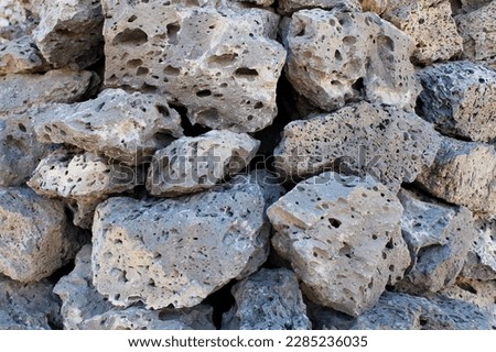 gray texture of stacked rocks Royalty-Free Stock Photo #2285236035