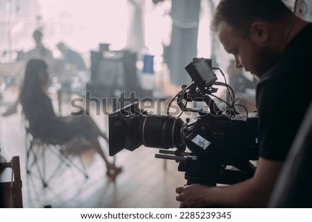 Film set, monitors and modern shooting equipment. Film crew, lighting devices, monitors, playbacks - filming equipment and a team of specialists in filming movies, advertising and TV series