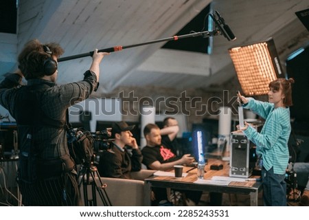 Film set, monitors and modern shooting equipment. Film crew, lighting devices, monitors, playbacks - filming equipment and a team of specialists in filming movies, advertising and TV series Royalty-Free Stock Photo #2285243531